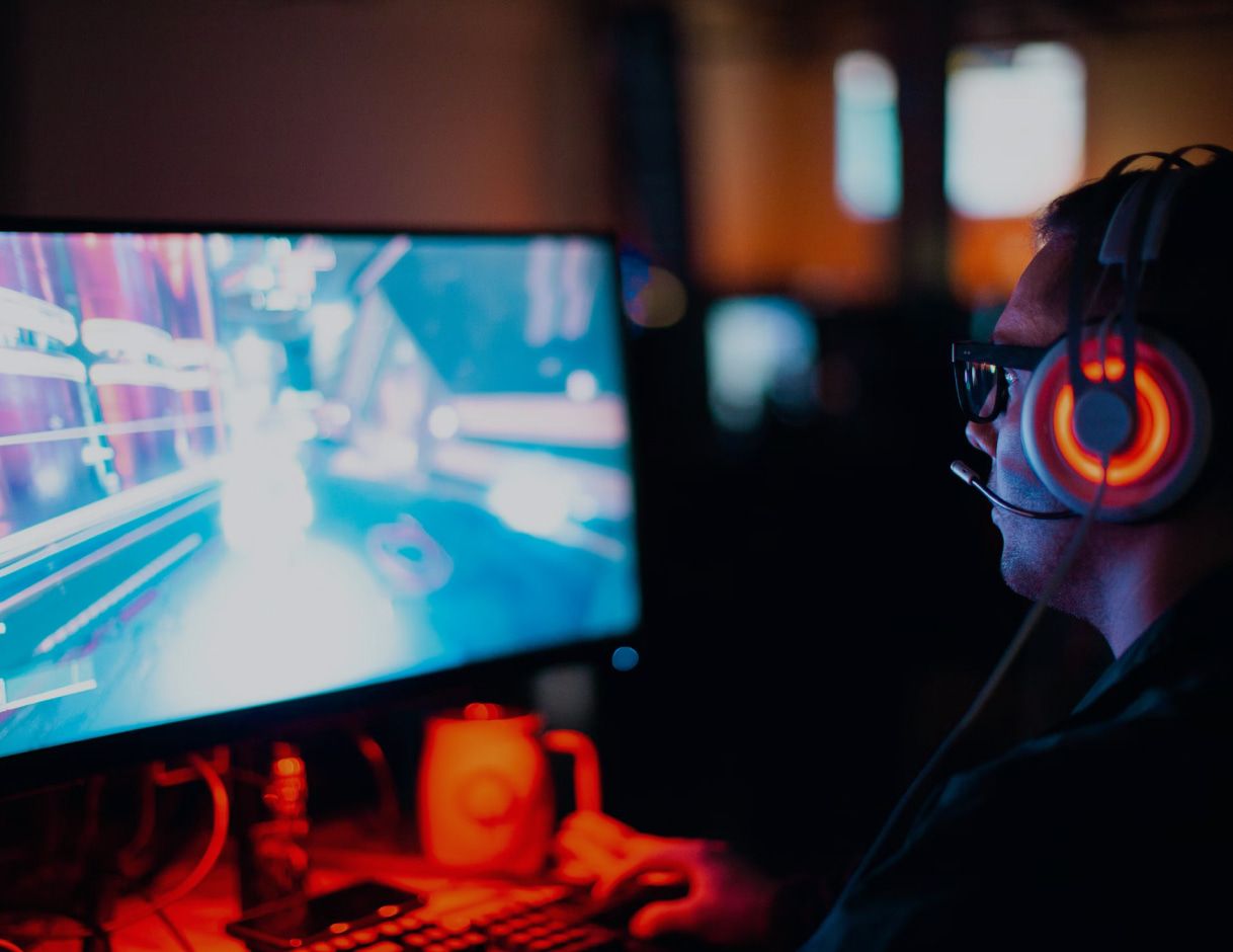 Person playing video games on gaming console