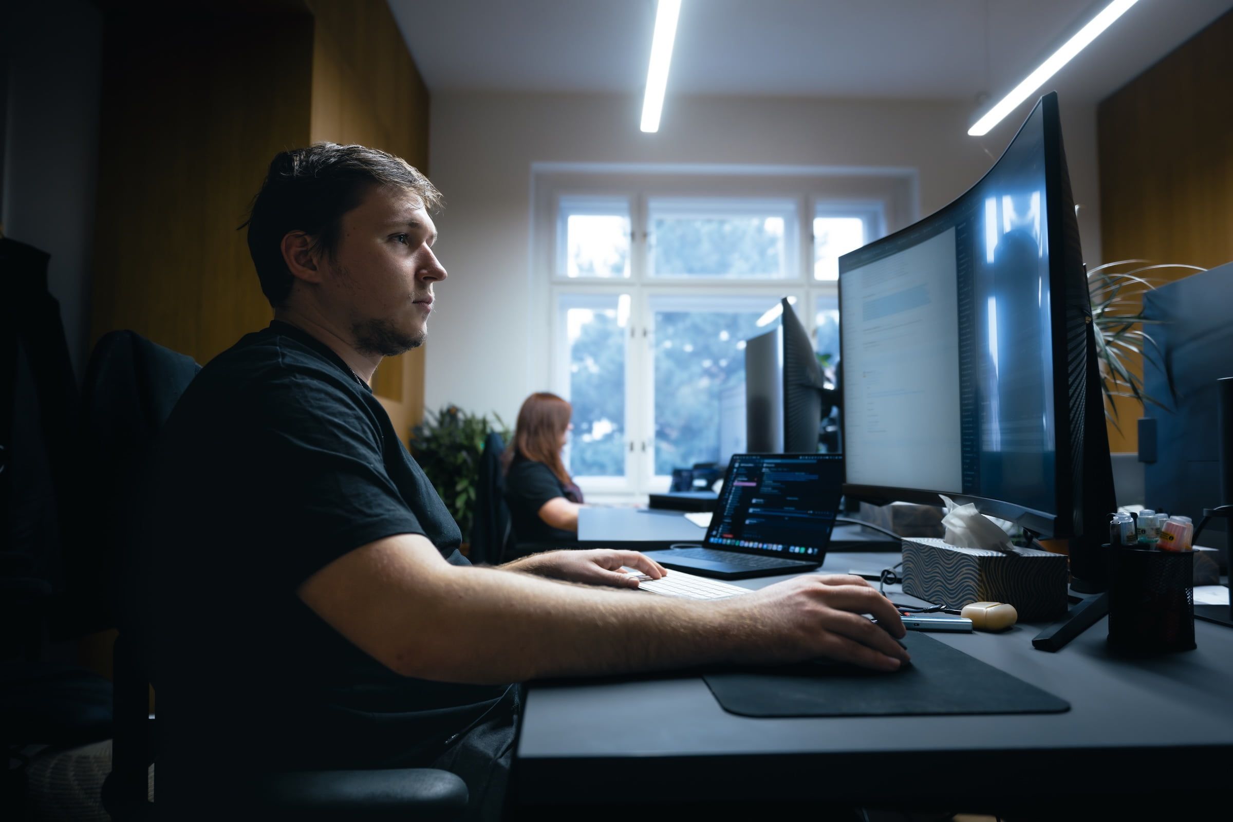 Members of the support team in their office